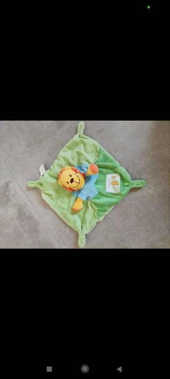 Doudou plat lion