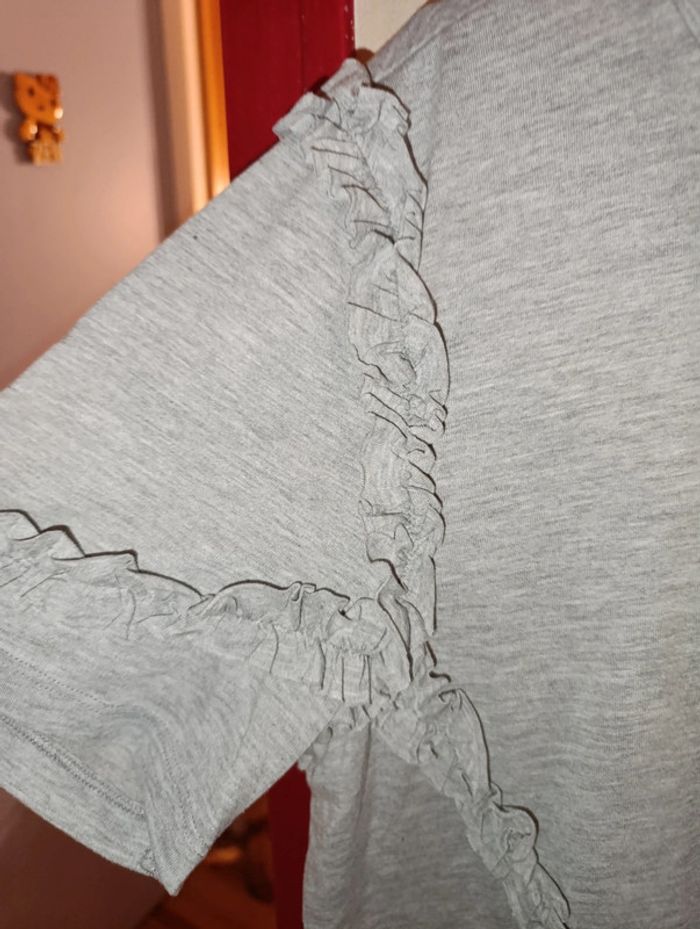 Superbe haut H et M taille L soit 42/44 - photo numéro 4