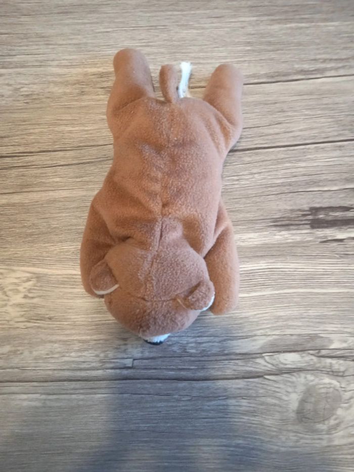 Peluche ourson couché - longueur 21 cm