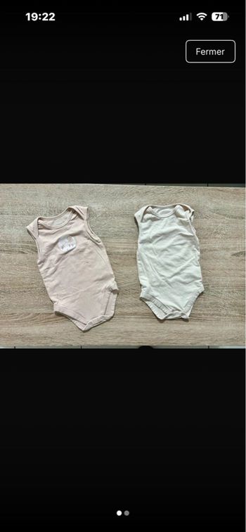 Lot 2 bodies sans manches Action T.6M