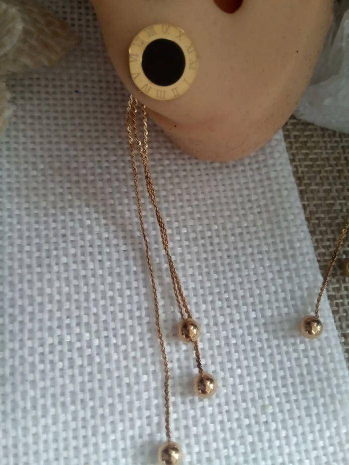 Boucles d'oreilles noires et or - photo numéro 2