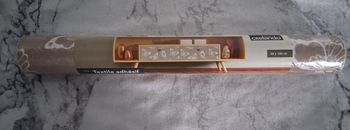 1 rouleau de textile adhésif neuf