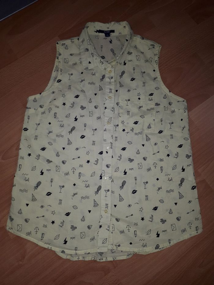 Chemisier blouse sans manches T S (16 ans)