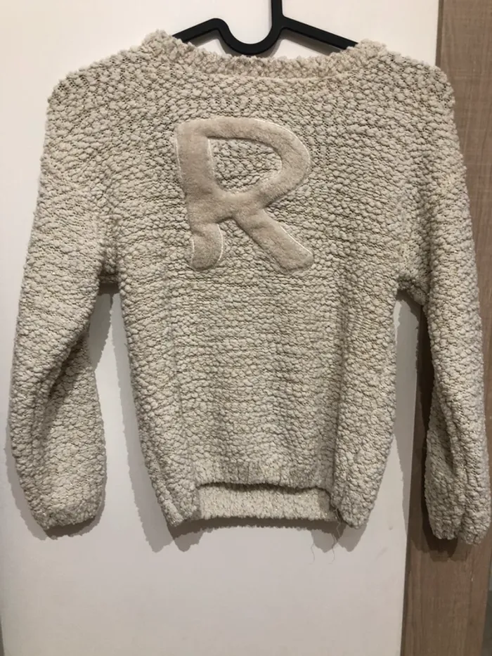 Pull blanc cassé et doré