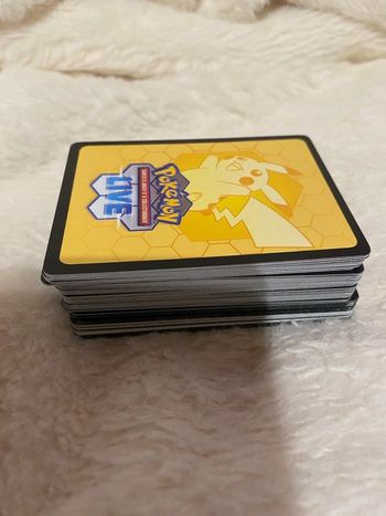 Lot de 131 carte à code online JCC Pokémon
