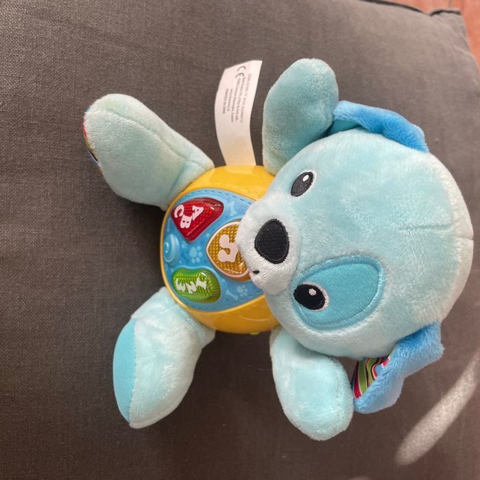 Chiot musical en peluche - photo numéro 2
