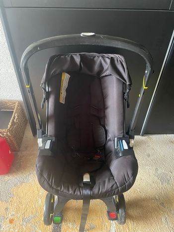 Doona siège auto poussette noir très bon état  Vend Doona