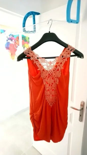 Petit haut long avec dentelle ethnique