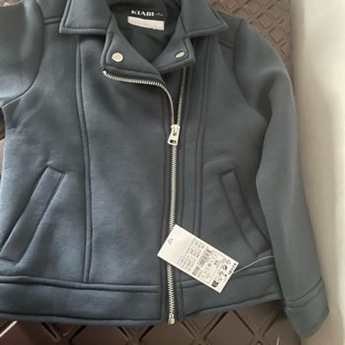 Veste fille neuve 5/6 ans