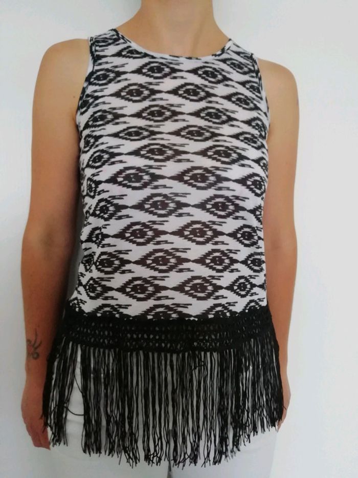 Haut court à franges