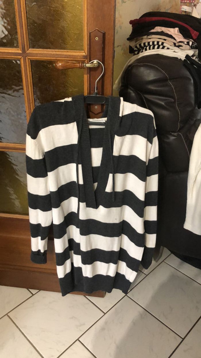 Pull a capuche col V