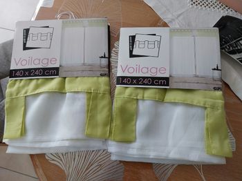 Jolie paire de voilages neuves