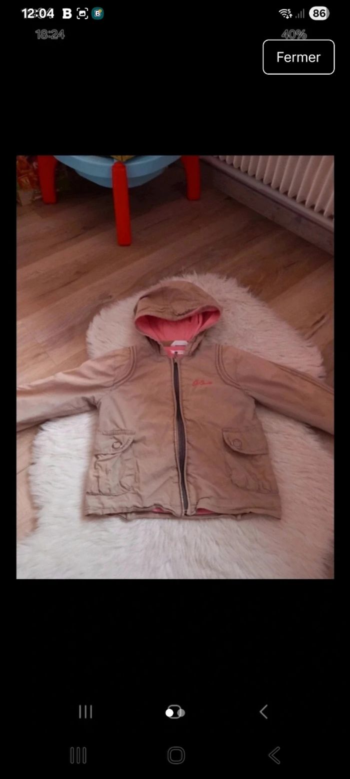 Très jolie veste 4 ans