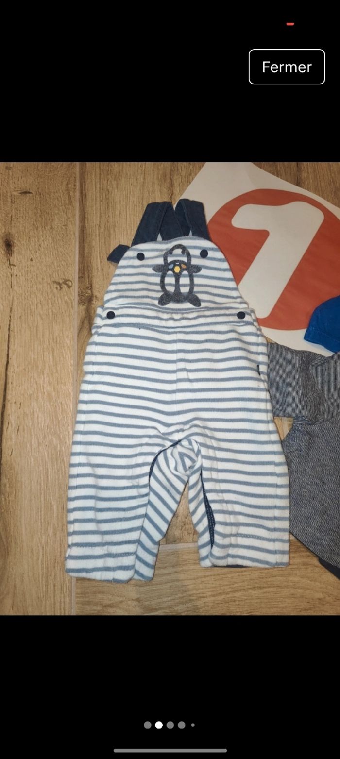 Lot ensemble 
1 salopette Obaibi 
1 t-shirt réversible Obaibi 
1 t-shirt manches courtes Kiabi 
1 t-shirt manches longues dino orchestra 
Taille 1 mois 53-56 cm - photo numéro 2