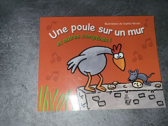 livre une poule sur un mur