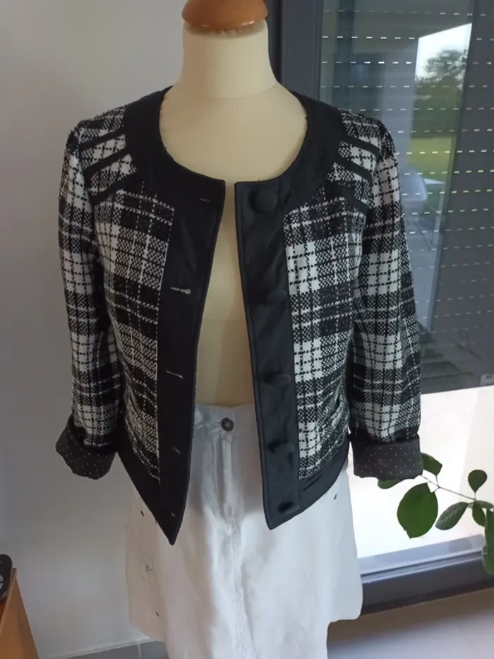 Ancienne veste à carreaux noire et blanche