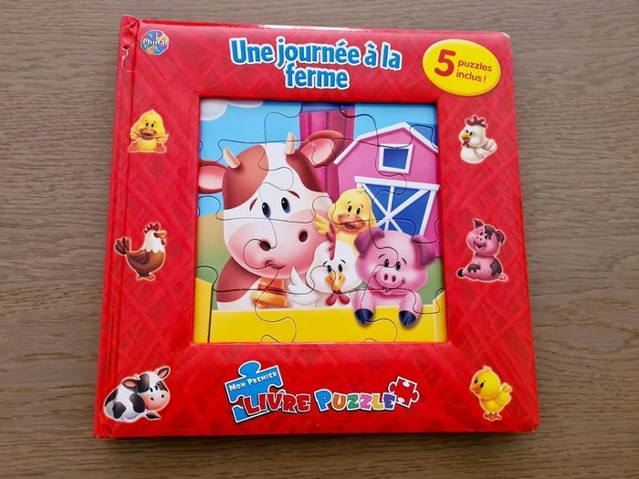 Livre puzzle une journée à la ferme en très bon état