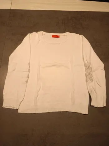 Vends pull fin enfant Tissaia taille 8 ans .