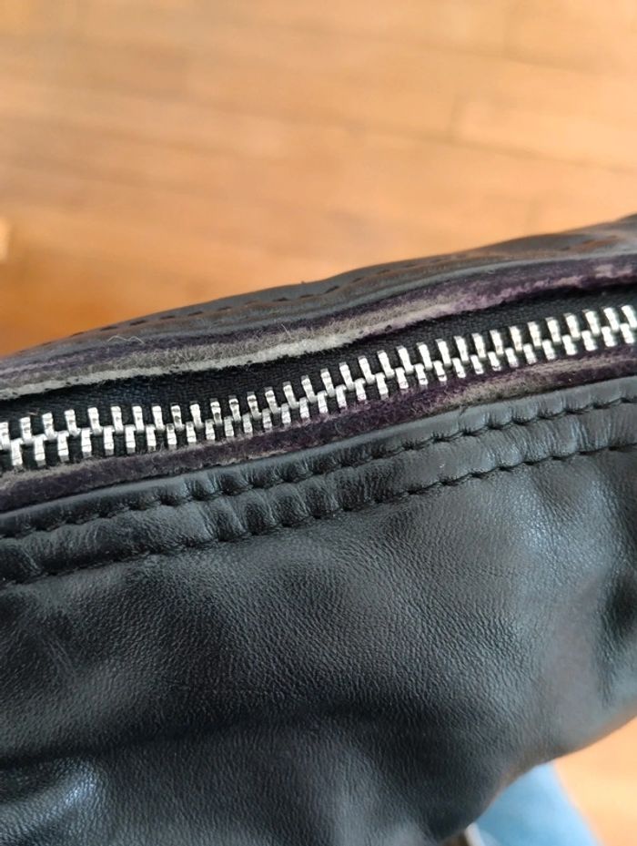 Veste en cuir perfecto 
Tressé aux épaules,
Bas ajusté,
Taille 40/42 - photo numéro 7