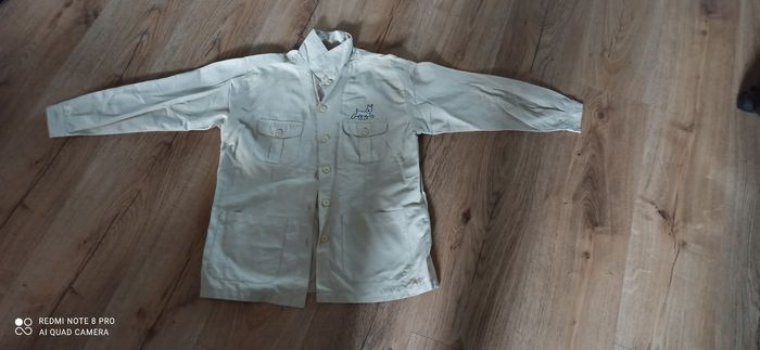 Veste beige tintin 10 ans
