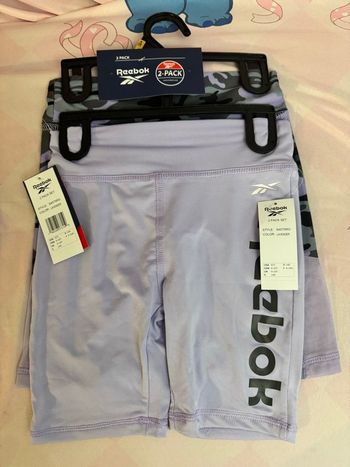 Lot 2 shorts fille reebok 9-10. Ans