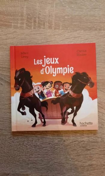Livre mac donald Les jeux d'olympie Marc Levy Très bon état
