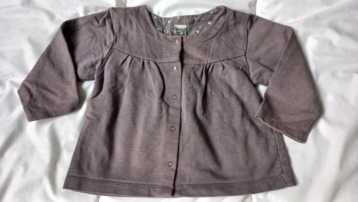 Gilet gris à pressions