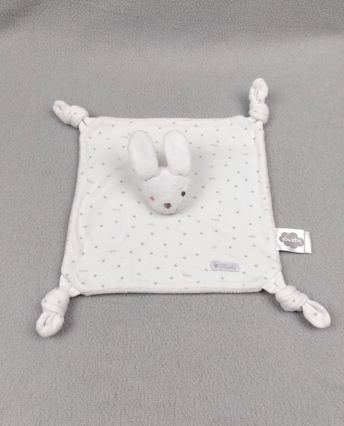 Doudou plat lapin blanc ABSORBA tissu étoiles grises bisou calin lire défaut SVP
