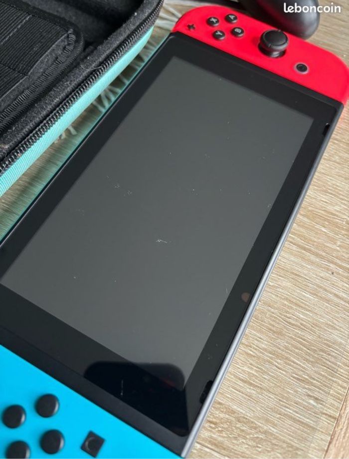 Nintendo Switch complet + Jeux - photo numéro 5