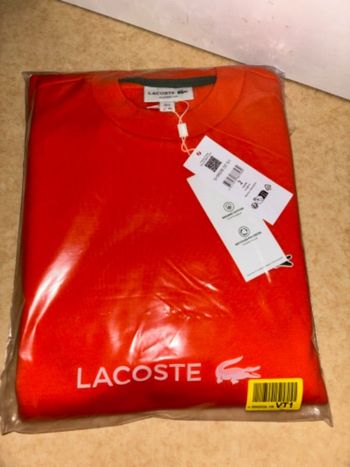 Sweat Lacoste orange neuf