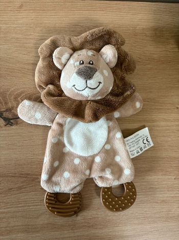 Doudou plat lion marron pois blanc anneau dentition zd trading action