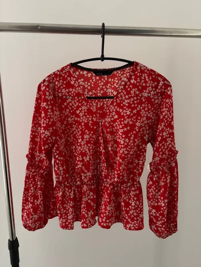 Blouse manche longue bouffant rouge à fleurs blanche