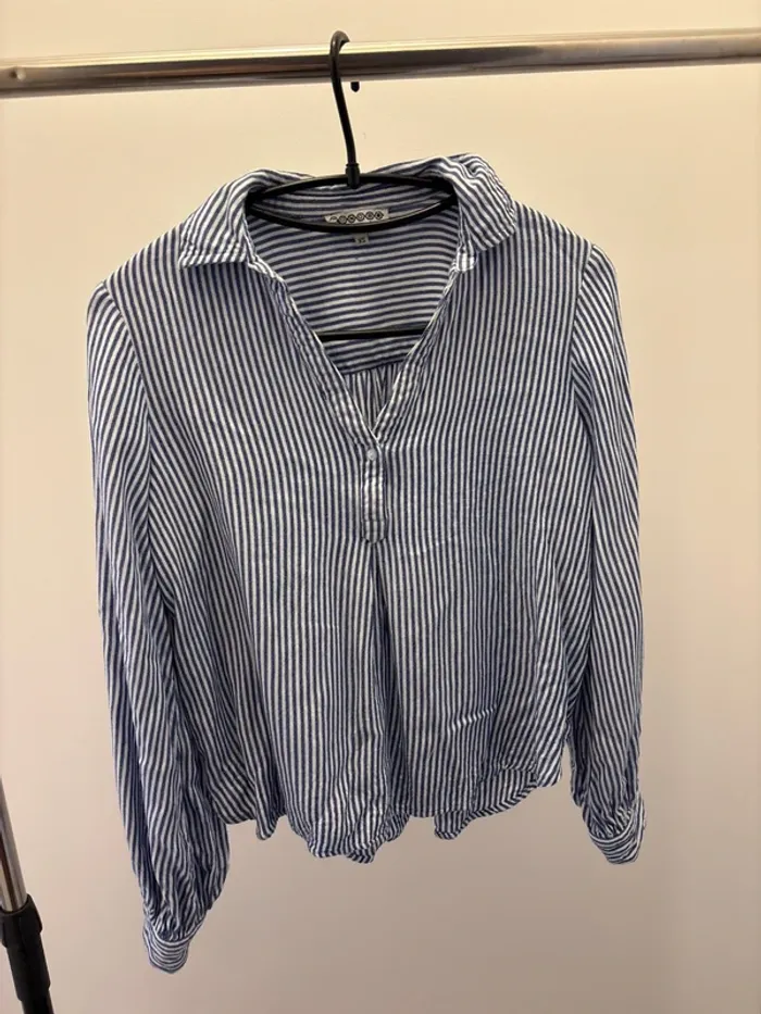 Blouse manche longue blanche et bleu à rayures