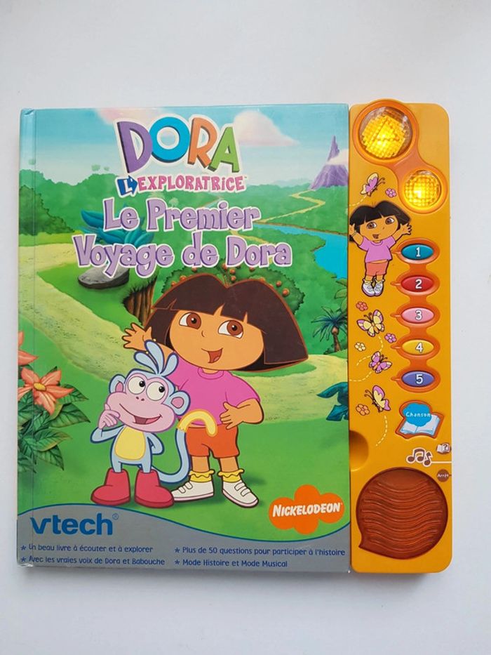 Livre interactif Le premier voyage de Dora l'exploratrice et figurines - photo numéro 2