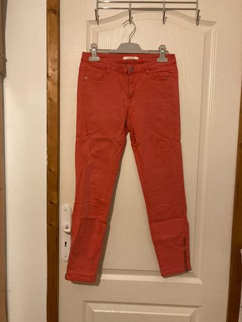 Jean skinny taille mi-haute rose avec fermetures en bas des jambes