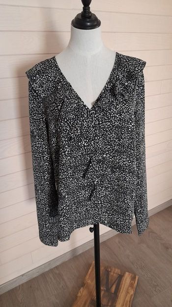 Blouse  manches longues noire et blanche motif léopard Deluxe