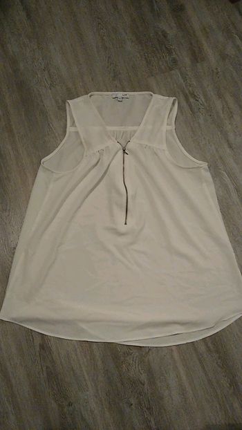 Joli t-shirt la halle taille 42 sans manche