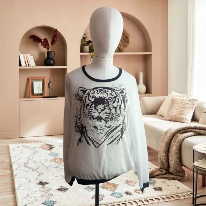 Blouse tigne blanc spot  taille 38