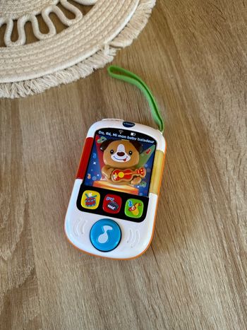 Jouet interactif Baby baladeur “Do Ré Mi” VTech Très bon état