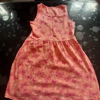 Robe courte in extenso 8 ans en bon état