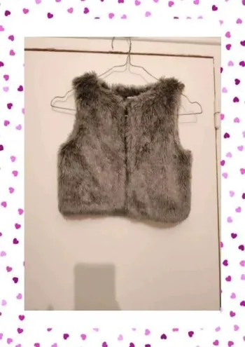 Gilet sans manches monoprix kids taille 6 ans