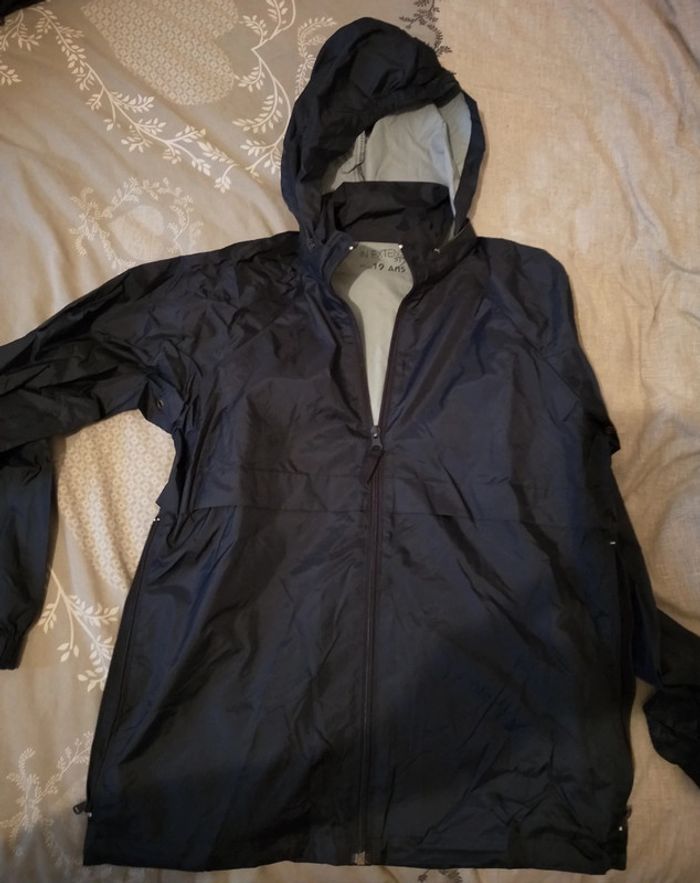 Veste de pluie in extenso