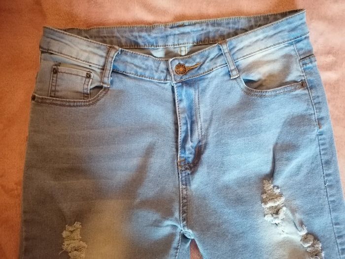 Jeans troué bleu clair - photo numéro 5