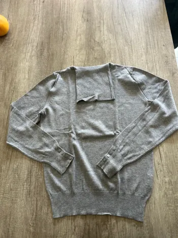 Pull col roulé