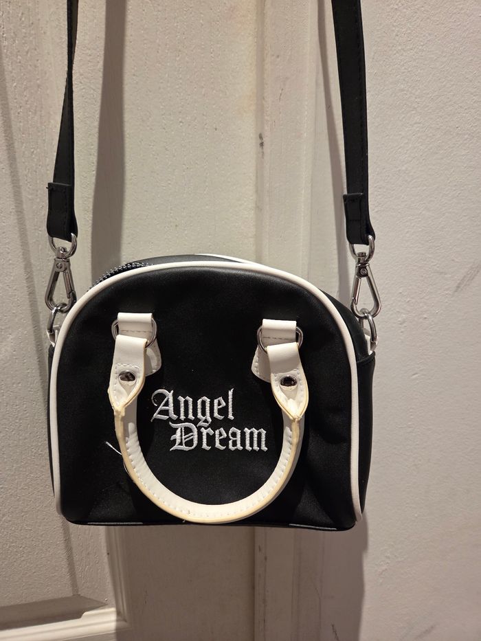 Petit sac blanc et noir avec double ance