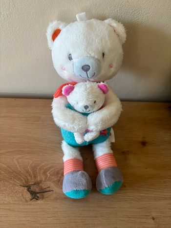 Doudou ours avec son bébé bleu orange musical ouatoo