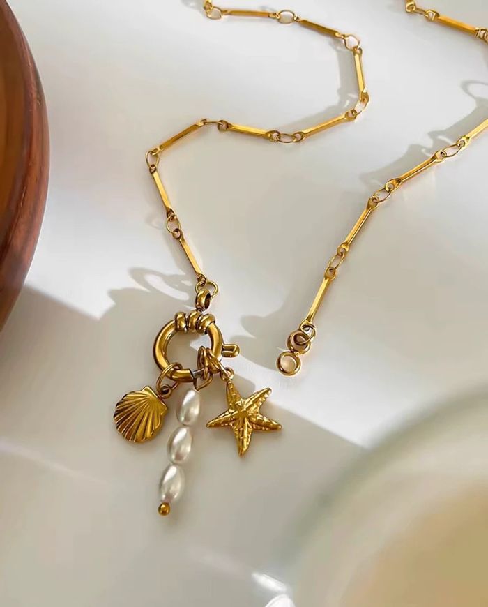 Collier “Trio Marin” en acier inoxydable 316L, pendentifs coquillage, étoile de mer & perle d’eau - photo numéro 4