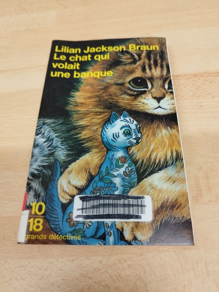 Lilian Jackson Braun

Le chat qui

volait

une banque