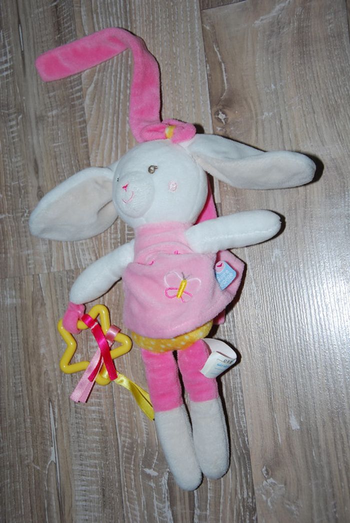 Doudou lapin rose blanc jaune papillon sucre d'orge