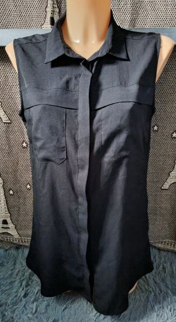 Chemisier noir sans manches taille 40